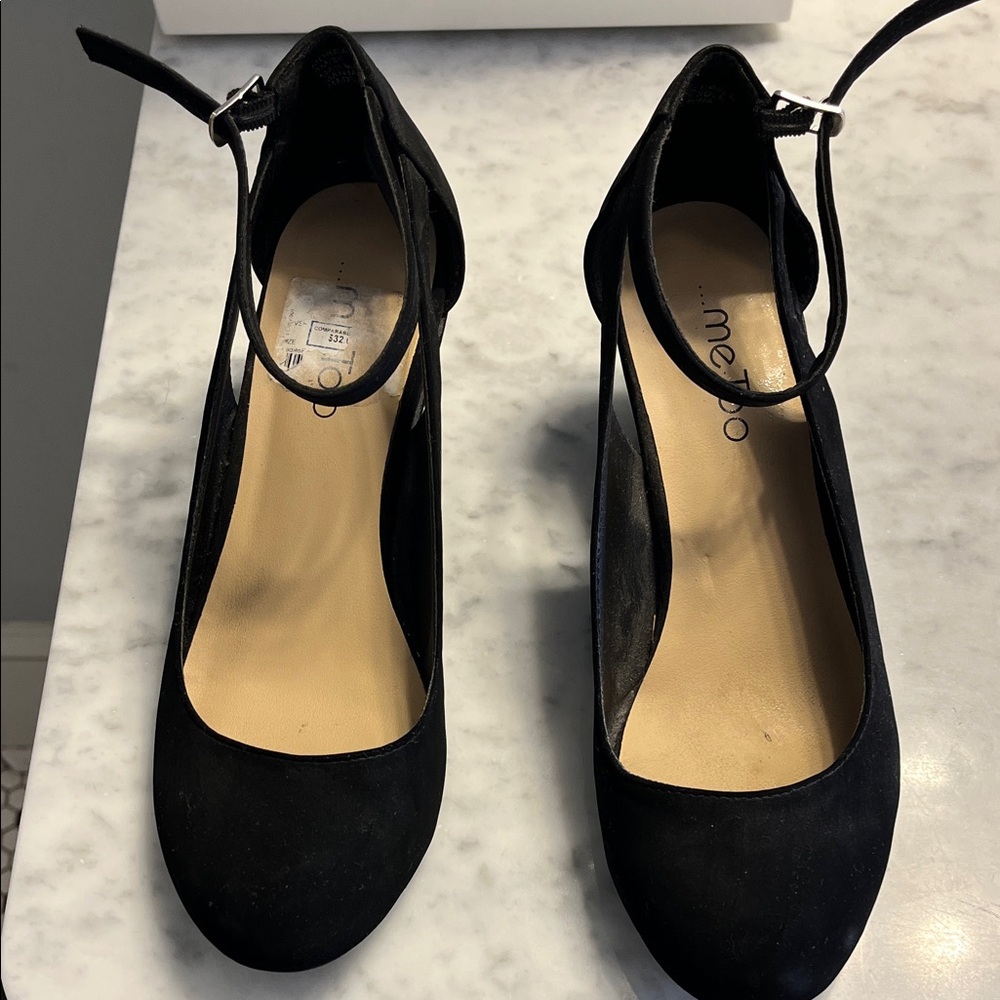 Ladies, black suede size 8 to 8 1/2 dress shoe with wedge heel
Worn once